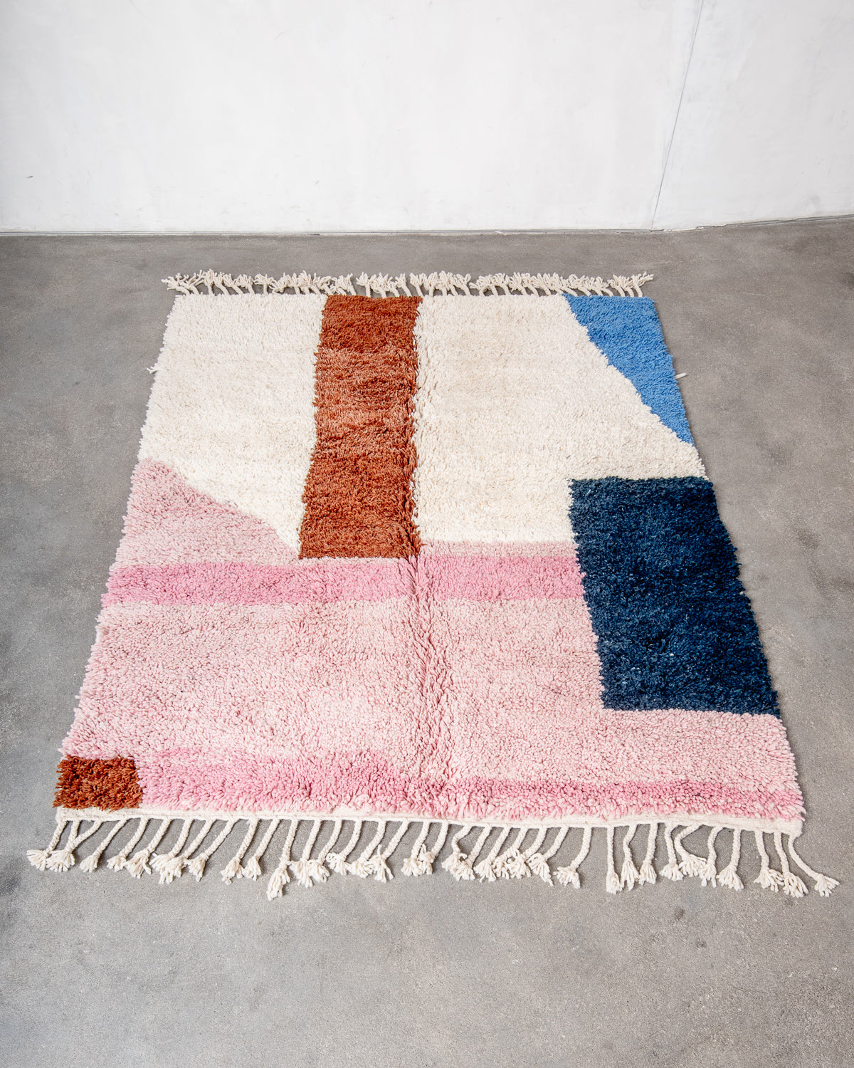 Modern, designer, handcrafted Berber rug from Morocco. Beniourain carpet with beautiful colours and patterns and fluffy wool texture.